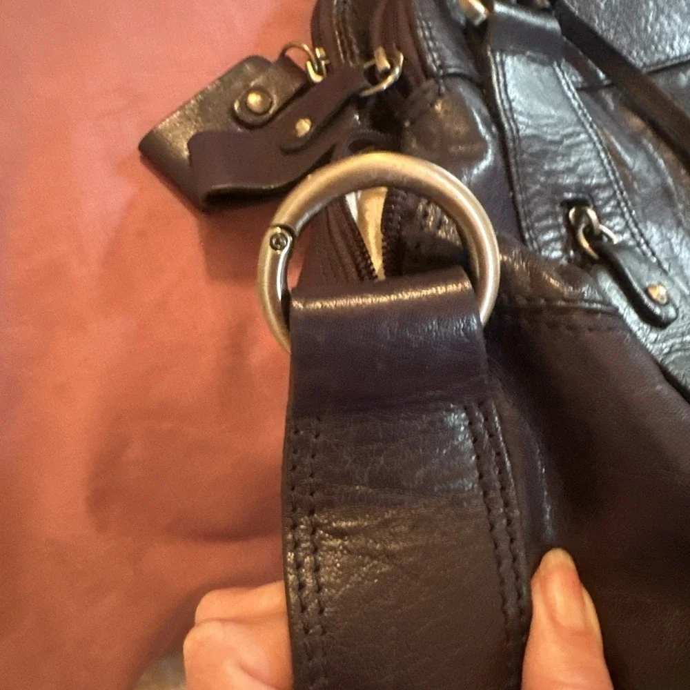 Nicoli Italian leather Large satchel features a dark purplish Blue finish